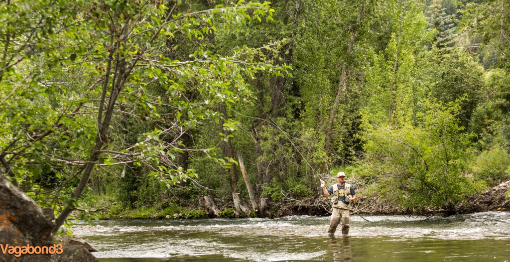 fly fisherman in river - vagabond3